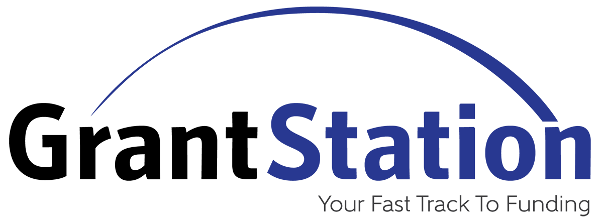 GrantStation Logo, featuring a purple swoosh above the words "GrantStation." Below, the words "Your Fast Track to Funding."